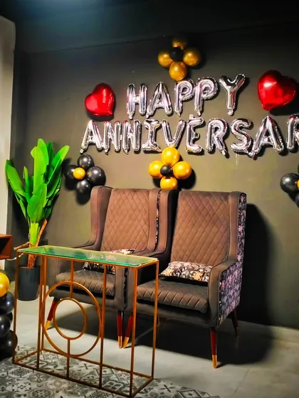 A slightly different angle of the first-anniversary setup, showing the comfortable seating area I decorated. It’s perfect for capturing memorable photos together.