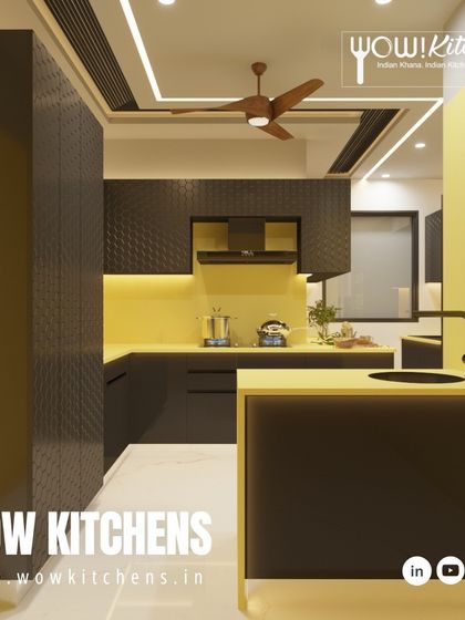 This view highlights the peninsula and sink area of the black and yellow kitchen, showing how a bold color scheme can be used to create a highly functional and stylish workspace.