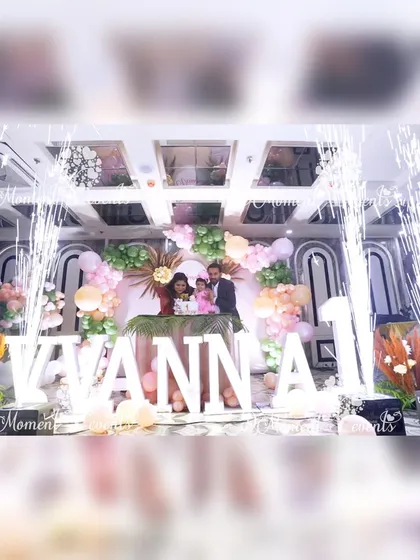 The cake-cutting moment at Vianna's boho teddy bear party, complete with a cold pyro sparkler display for a dramatic and celebratory effect.