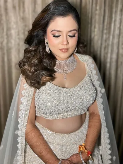 A close-up of the eye makeup for this engagement look. The soft pink shimmer on the lids adds a romantic touch.