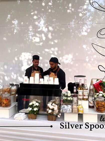 A full-service coffee bar setup for a corporate event. My professional baristas are on hand to prepare a range of hot beverages, providing a cafe-quality experience for your guests.