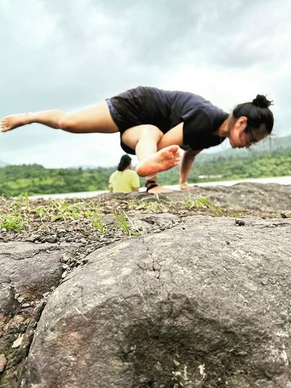 Anytime, anywhere arm balancing is a must. A flying pigeon pose on the rocks during a trek, connecting my practice with the raw energy of nature.