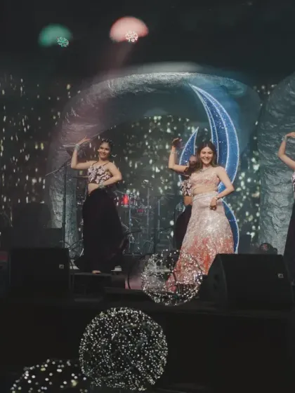 Another angle of the bride's elegant solo performance, highlighting the choreography and the futuristic stage design.