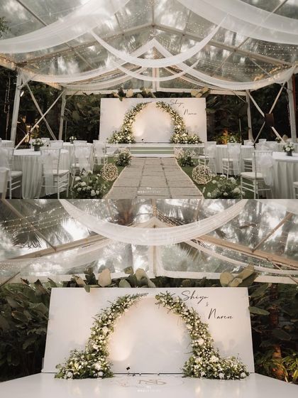 A serene and elegant all-white wedding reception theme. The clear-top tent allows guests to dine under the stars, while the minimalist decor highlights the natural beauty of the surrounding greenery at The Farmhouse Collective.