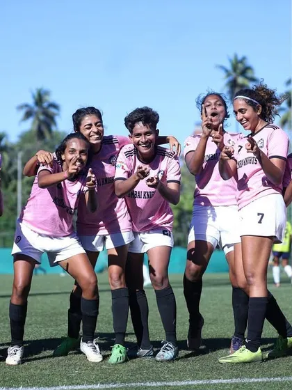 A fun, celebratory team pose after a dominant performance.