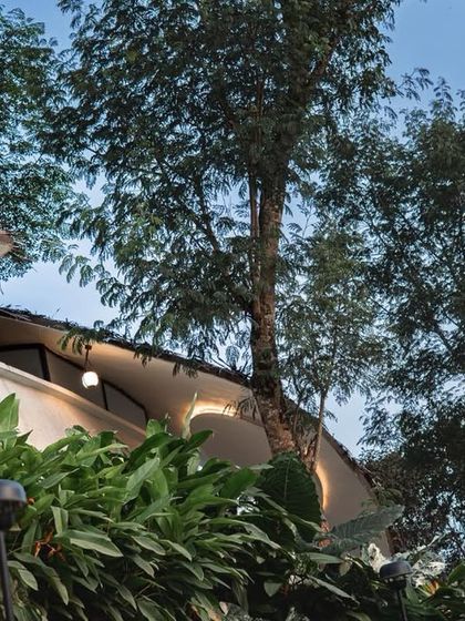 The unique, flowing roofline of 'Earth's Embrace' is designed to follow the site's natural contours with zero disturbance to the existing landscape.