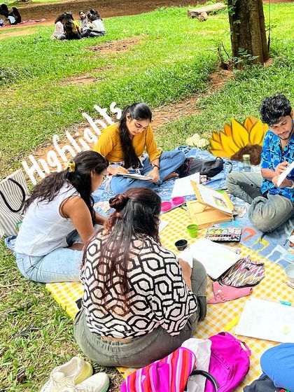 A candid shot from one of our sessions. You can see the focus and calm as participants get lost in their painting. I'm always nearby to offer guidance and support.