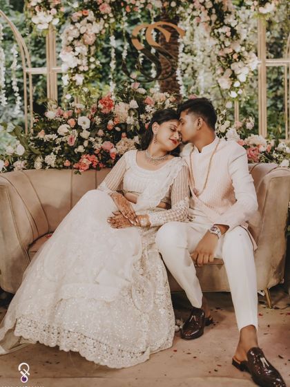 A romantic kiss on the cheek, a sweet moment from the couple's engagement day.