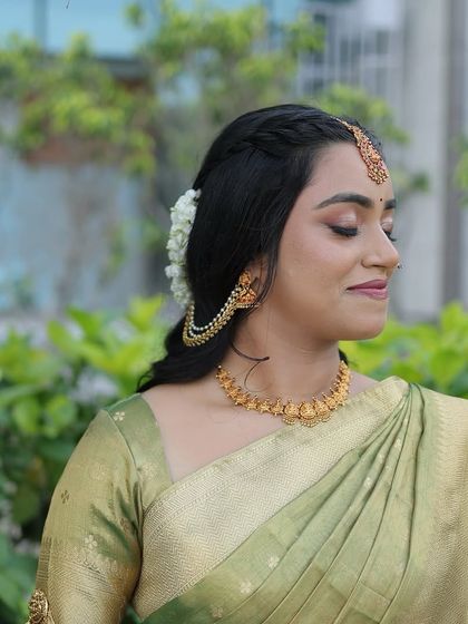 Another view of the soft, glowing makeup. The focus is on creating a look that is timeless and elegant, perfect for a South Indian bride.