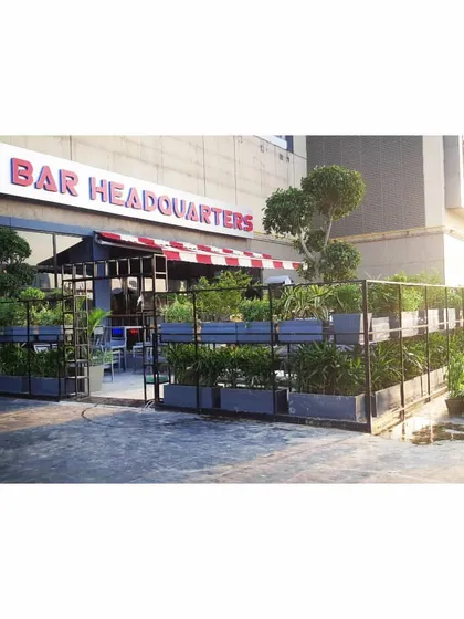 We designed this green perimeter for the outdoor seating area at My Bar Headquarters in Noida. The tiered planter system creates a natural barrier from the street, providing privacy and a more intimate setting for customers.