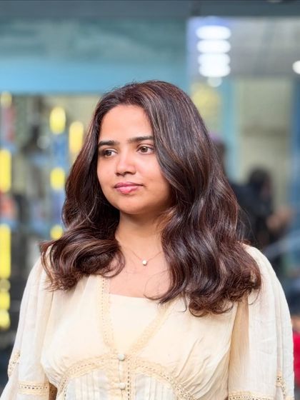 A beautiful example of our Ginger Brown color. This shade offers a warm, spicy tone that is both subtle and striking, perfect for a sophisticated change.