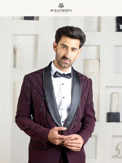 A framed, formal portrait of the wine-colored tuxedo, showcasing it as a centerpiece of my collection. The craftsmanship and design speak for themselves.