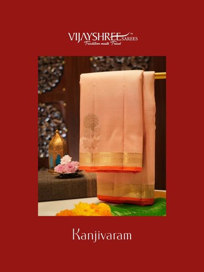 A pastel Kanjivaram with floral motifs in gold zari, a delicate and modern option.