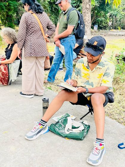 A candid moment of me sketching with the USK Nagpur group.