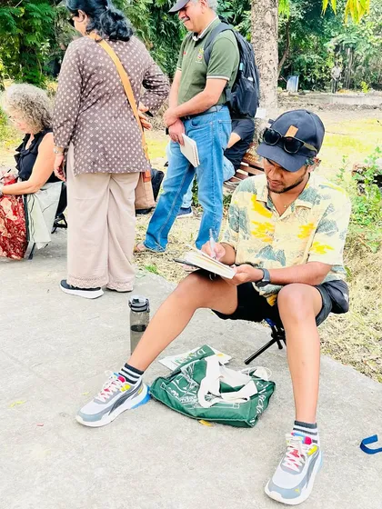 A candid moment of concentration during the sketch walk. These events are a great mix of social fun and focused creative time.