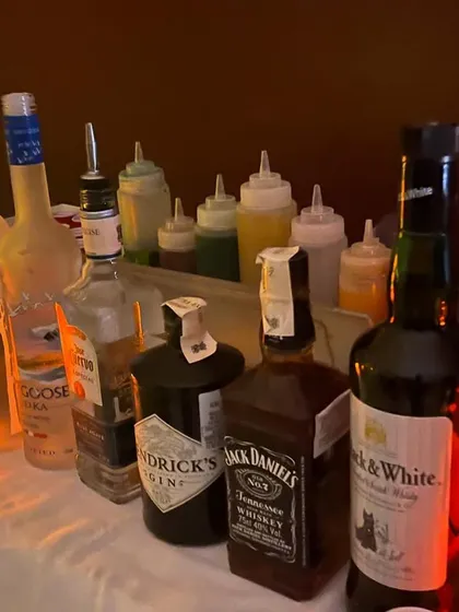 A selection of premium spirits for our Halloween party, including Grey Goose, Hendricks, and Jack Daniels. We always use quality brands.