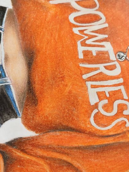 A detail shot of the orange sweater, showing the shading that gives it a soft, worn-in look.