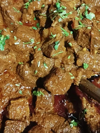 I also offer a special beef curry, cooked with a thick, spicy gravy and fresh herbs. It's a rich and hearty meal, different from my pork dishes but just as authentic.