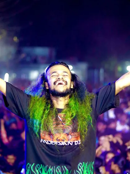 The connection with the crowd is everything. This moment captures the pure joy and energy I share with the audience at every show. It's all about good vibes and great music.
