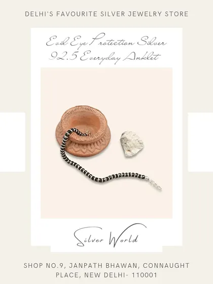 An everyday anklet made with silver and black beads, offering protection from the evil eye. This is a classic 'nazaria' design.
