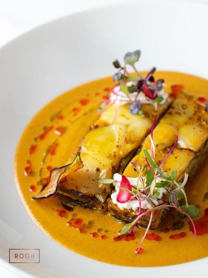 A different angle of the Baingan Bharta Terrine, showing the delicate layers and the smooth texture of the surrounding sauce. It’s a classic comfort food elevated to an art form.