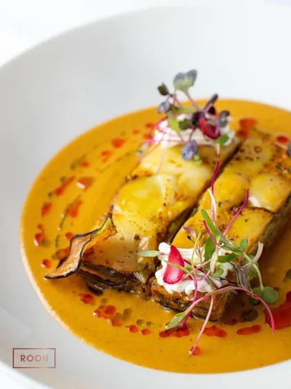 A different angle of the Baingan Bharta Terrine, showing the delicate layers and the smooth texture of the surrounding sauce. It’s a classic comfort food elevated to an art form.