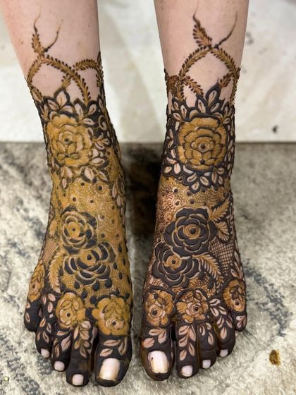 Both feet with the matching heavy floral design.