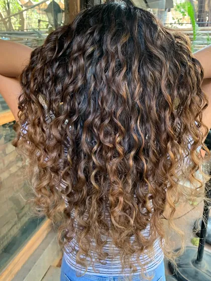 Mermaid hair for this bride-to-be's curly locks. I painted in some dimension with a non-bleach color for a beautiful, natural-looking ombre effect.