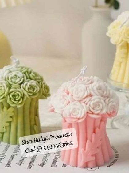 These rose bouquet candles in green, pink, and yellow show the variety you can achieve with different colors. They make for a stunning and unique decorative set.
