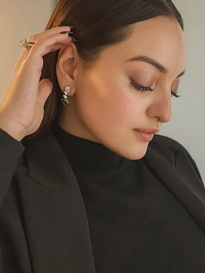 A profile of elegance, Sonakshi Sinha wears my diamond and gemstone earrings. This image captures a quiet moment of glamour and highlights the versatility of my pieces.