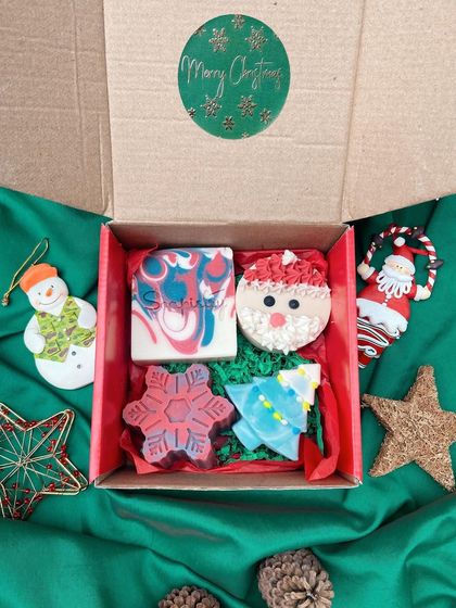My Christmas Gift Box makes holiday gifting so easy. Each box is a curated set of my favorite festive designs, including a full-sized bar, a Santa soap, a Christmas tree, and a snowflake, all packed and ready to go.