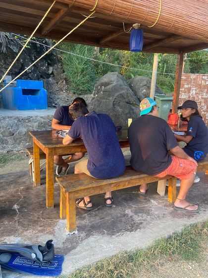 Moments from our Andaman dive trips, showing everything from gearing up at the dive center to relaxing on the boat between dives.