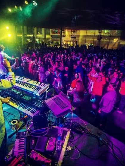 A view from our keyboardist's perspective, looking out at a dance floor full of happy faces.