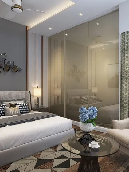 A 3D design for a glamorous bedroom featuring a full-wall mirrored wardrobe that visually doubles the space. The geometric flooring and metallic wall art add layers of modern sophistication.