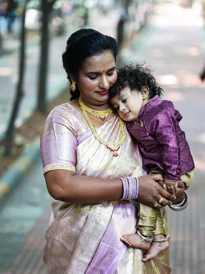 A mother's gentle embrace. These are the unposed, heartfelt moments that I believe make the most precious family photographs.