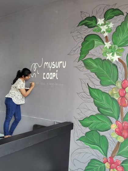 Bringing the coffee vibe to a new branch of Mysuru Kaapi. This mural shows the coffee plant from blossom to berry, a perfect theme for a place that celebrates authentic filter coffee.