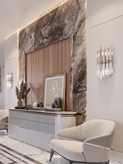 Detail of a console unit in the drawing room. The dramatic marble slab is framed by wood paneling, creating a sophisticated backdrop for curated art and decor.