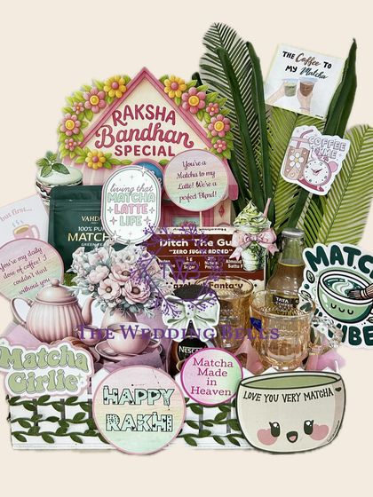 A complete view of our "Matcha Girlie" Rakhi hamper. We've included a teapot, matcha powder, coffee, and lots of fun accessories to create the perfect vibe.