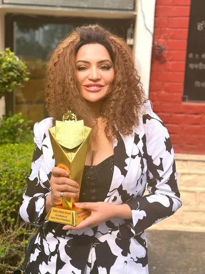 Holding the Noble Icon Award. This recognition is a testament to the hard work and dedication I pour into my practice and my fight for justice. It's not just an award; it's a milestone in my journey.