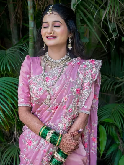 A portrait of a radiant bride, her smile lighting up the frame. We aim to capture the genuine happiness and bridal glow, creating timeless portraits that reflect your joy.