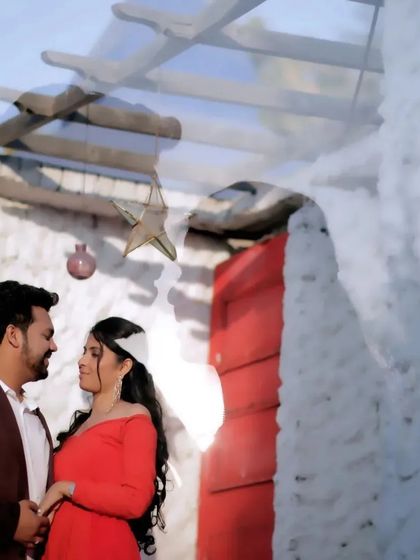 A soft and dreamy pre-wedding portrait with a double exposure effect. This artistic technique adds a layer of romance and visual interest to the couple's embrace.