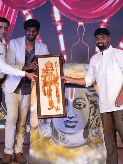 Presenting my artwork on stage at the Advaya Dance Festival, a celebration of art and culture.