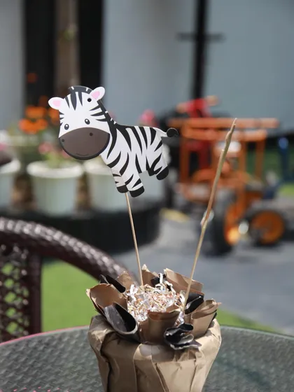 Even the table centerpieces are themed! This little zebra decoration adds a touch of the wild to every table setting.