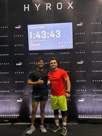 With a fellow competitor after finishing the race. We push each other to be better. The camaraderie in the fitness community is a powerful motivator.