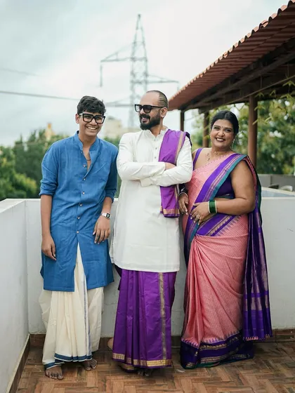 A family that celebrates together, should shine together. I designed these coordinated outfits for my wedding day, a custom pink and purple saree look for me, and matching traditional wear for my husband and son. I create bespoke outfits for the entire family for any occasion.