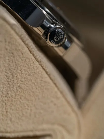 A macro shot focusing on the signed crown of the Explorer II. Every element is inspected to ensure it meets our strict standards for authenticity and quality. No FuFu, ever.