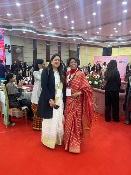 With a fellow attendee at Day 1 of the International Women Summit.