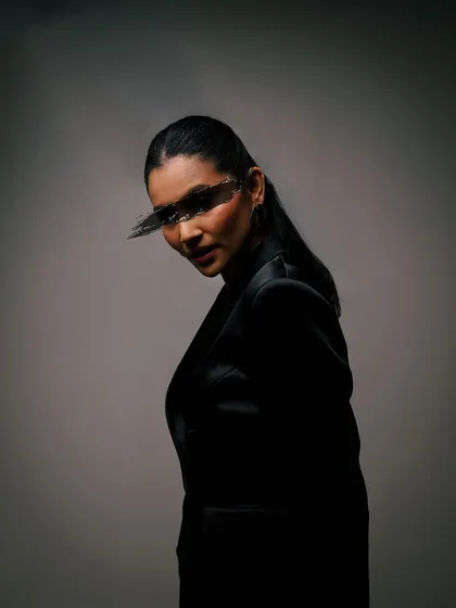 A moody studio portrait with futuristic eyewear. I love experimenting with different styles and concepts in my photoshoots.