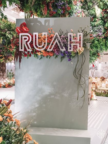 The welcome sign for the 'Orchard of Life' naming ceremony, with the baby's name beautifully displayed.