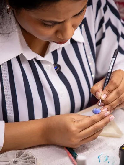 Close-up of fine line work in progress. Precise, steady hands are a skill we build through dedicated practice on foundational exercises like swirls and lines.